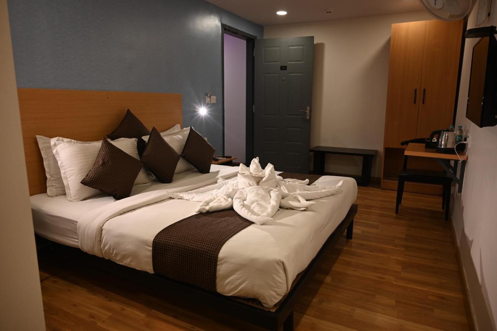 Alchemy Suites Bangalore Phòng bức ảnh